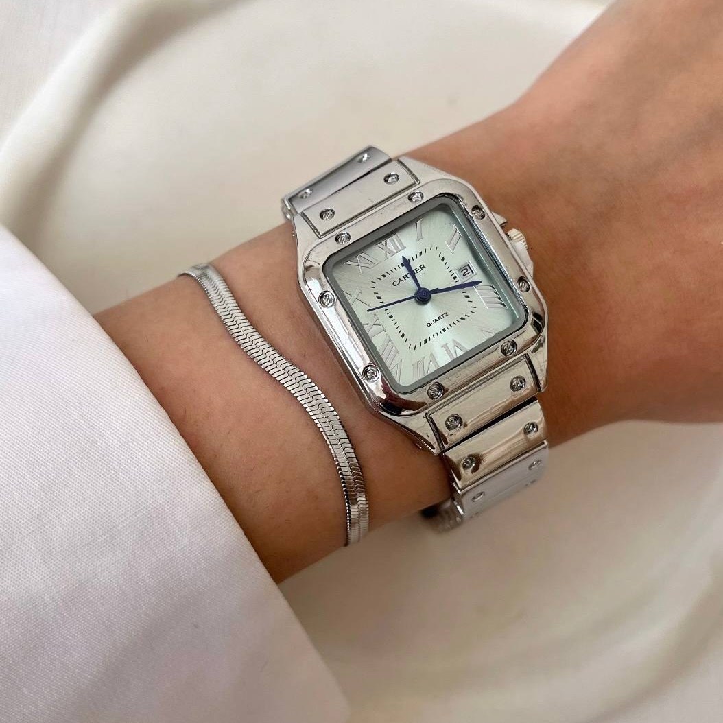 "خرید ساعت کارتیر زنانه سانتوز با صفحه آبی روشن | طراحی لوکس و کیفیت بی‌نظیر"