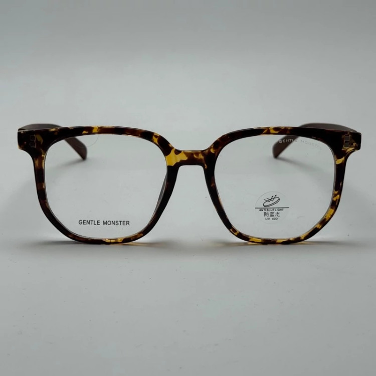 تصویر فریم عینک بلوکات طبی جنتل مانستر TR 8979 رنگ هاوانا به همراه کاور پارچه ای و دستمال