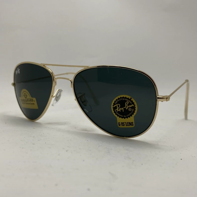 تصویر عینک آفتابی ریبن خلبانی شیشه سنگ مشکی طلایی با پک کامل اورجینال