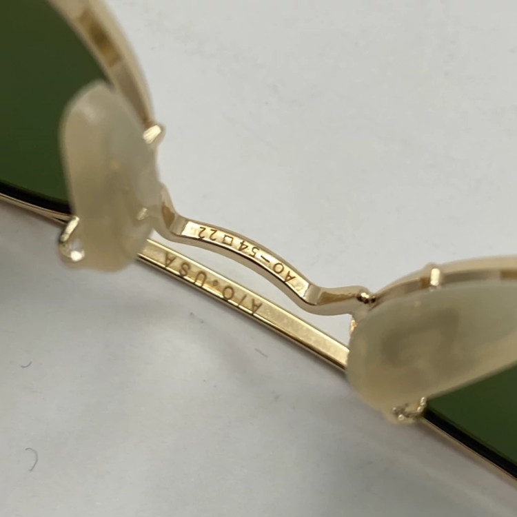 تصویر عینک AO آمریکن اپتیکال شیشه سنگ سبز با پک کامل اورجینال سایز 54