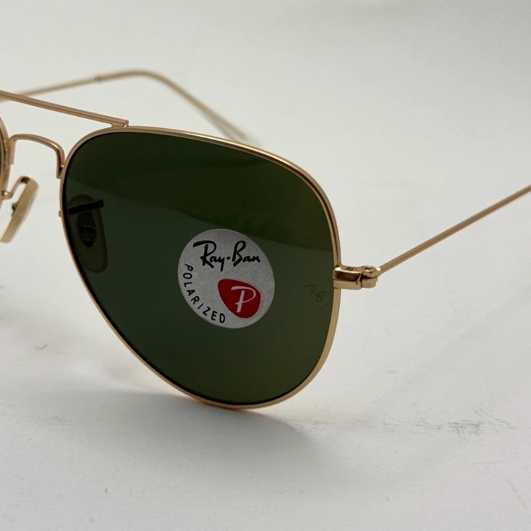 تصویر عینک ریبن خلبانی شیشه سنگ پلاریزه سبز با فریم طلایی به همراه پک کامل ریبن کد Rayban RB 3026