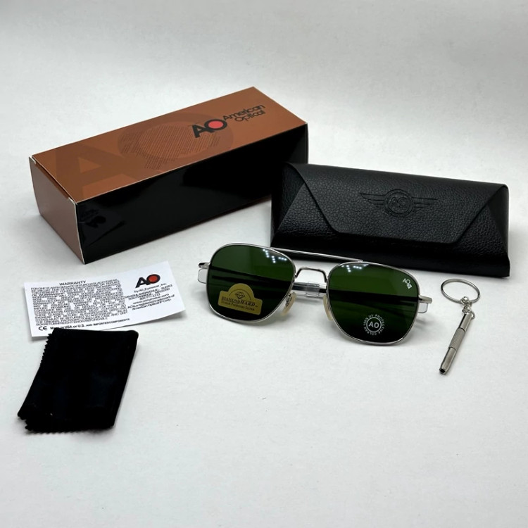 تصویر عینک آفتابی شیشه سنگ آمریکن اوپتیکال فریم نقره ای عدسی سبز سایز 54 آنتی رفلکس با پک کامل و آچار مخصوص عینک