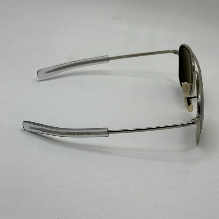 تصویر عینک آفتابی شیشه سنگ آمریکن اوپتیکال فریم نقره ای عدسی سبز سایز 54 آنتی رفلکس با پک کامل و آچار مخصوص عینک
