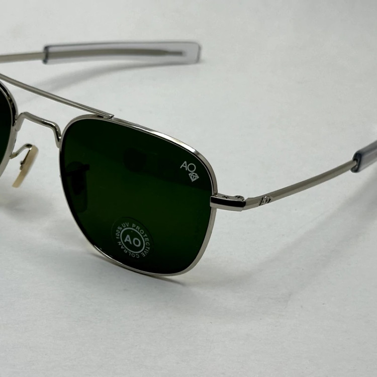تصویر عینک آفتابی شیشه سنگ آمریکن اوپتیکال فریم نقره ای عدسی سبز سایز 54 آنتی رفلکس با پک کامل و آچار مخصوص عینک