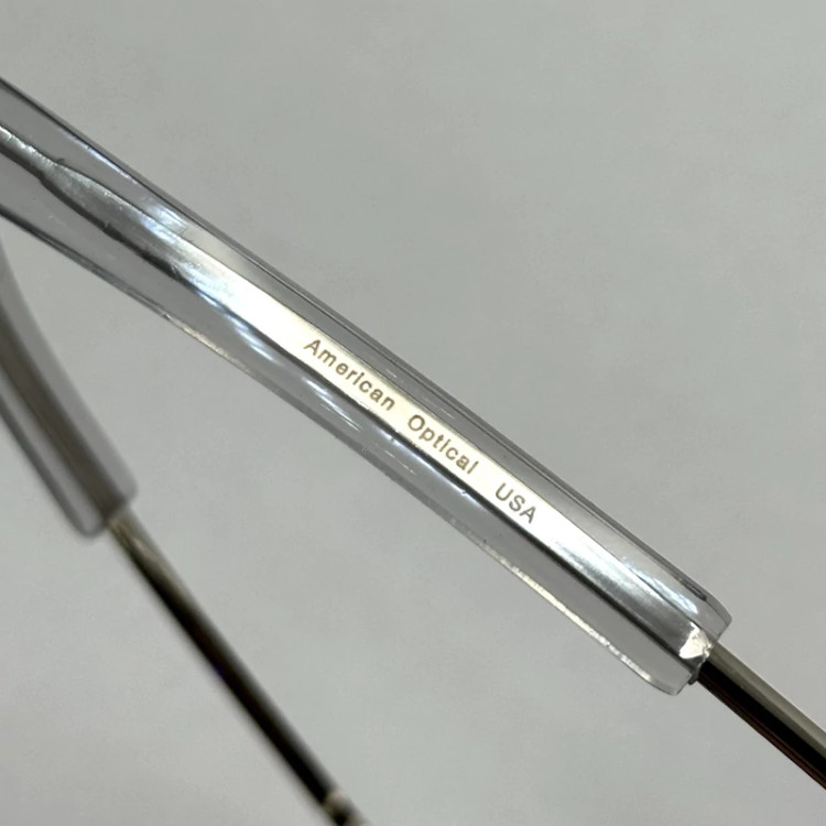 تصویر عینک آفتابی شیشه سنگ آمریکن اوپتیکال فریم نقره ای عدسی سبز سایز 54 آنتی رفلکس با پک کامل و آچار مخصوص عینک