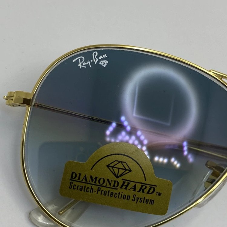 تصویر عینک ریبن خلبانی شیشه سنگ آبی با پک کامل اورجینال نشکن و زد خش ، زد اشعه ، زد زنگ