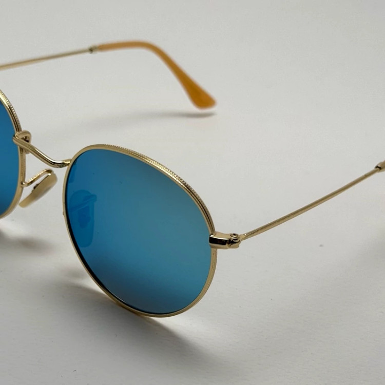 تصویر عینک آفتابی پلاریزه گرد فوق سبک آبی آسمونی فریم طلایی کد 3447