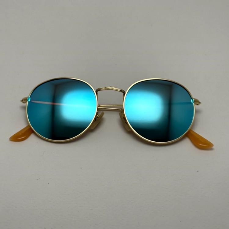 تصویر عینک آفتابی پلاریزه گرد فوق سبک آبی آسمونی فریم طلایی کد 3447