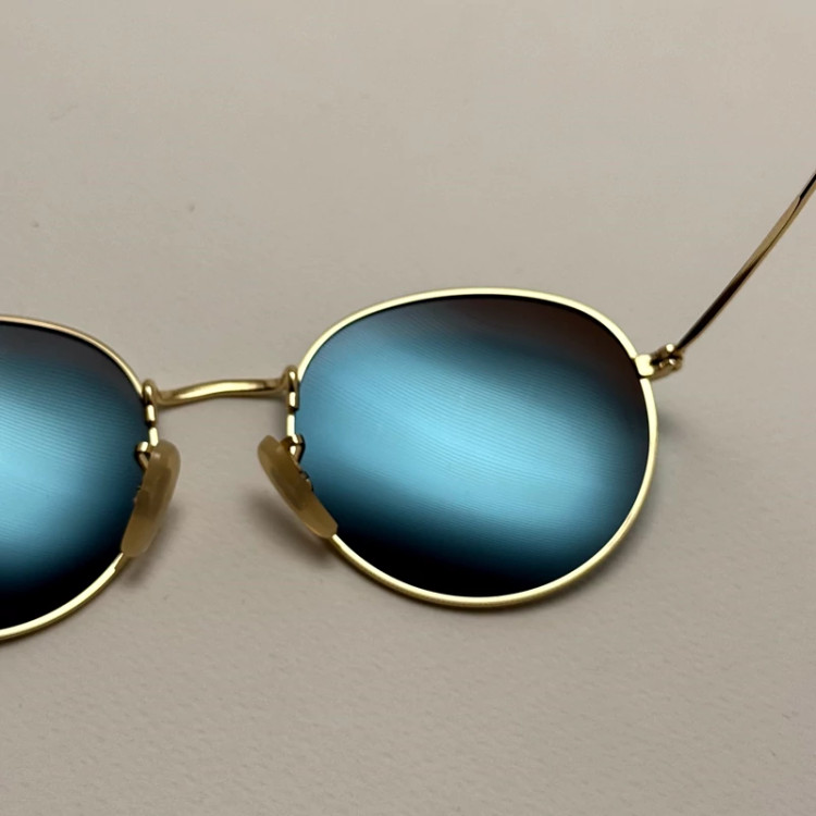 تصویر عینک آفتابی پلاریزه گرد فوق سبک آبی آسمونی فریم طلایی کد 3447