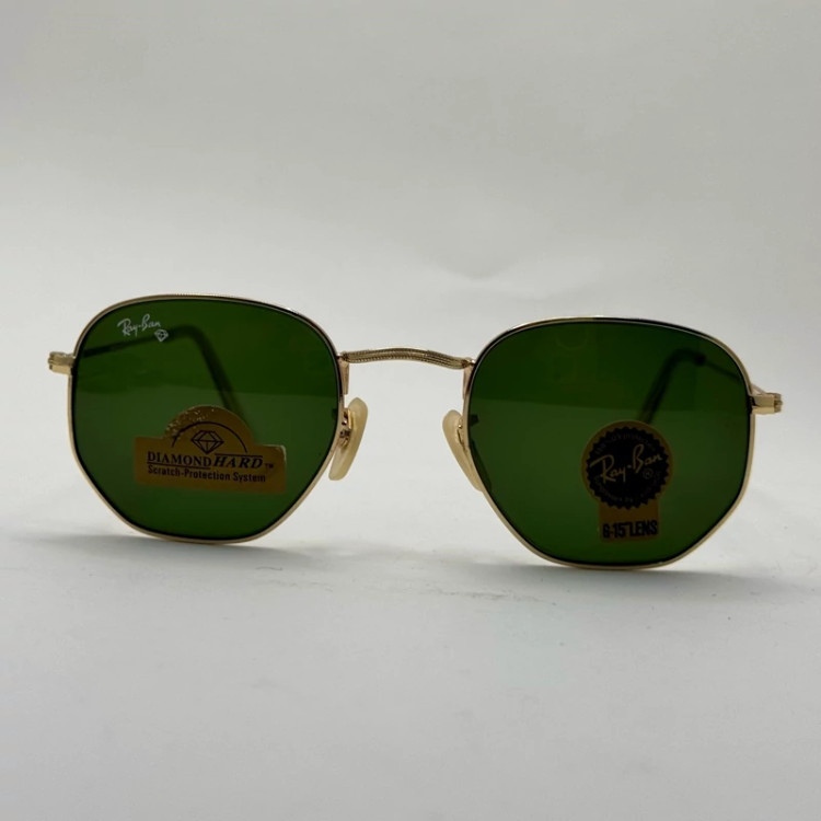 تصویر عینک ریبن هگزونال شیشه سنگ سیز فریم طلایی به همراه پک کامل ریبن کد Rayban RB 3548