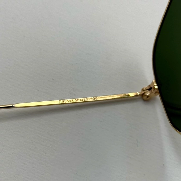 تصویر عینک ریبن هگزونال شیشه سنگ سیز فریم طلایی به همراه پک کامل ریبن کد Rayban RB 3548