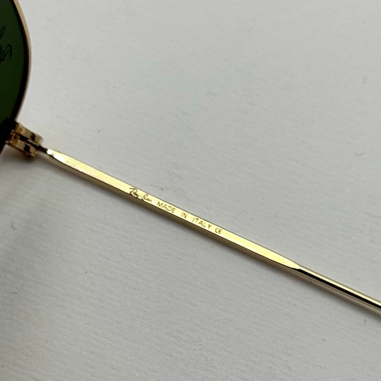 تصویر عینک ریبن هگزونال شیشه سنگ سیز فریم طلایی به همراه پک کامل ریبن کد Rayban RB 3548