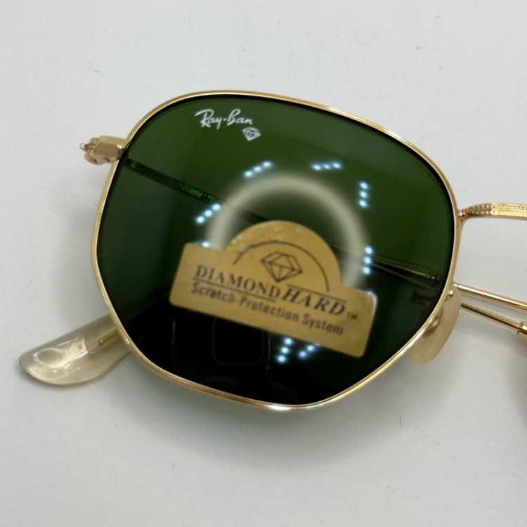 تصویر عینک ریبن هگزونال شیشه سنگ سیز فریم طلایی به همراه پک کامل ریبن کد Rayban RB 3548