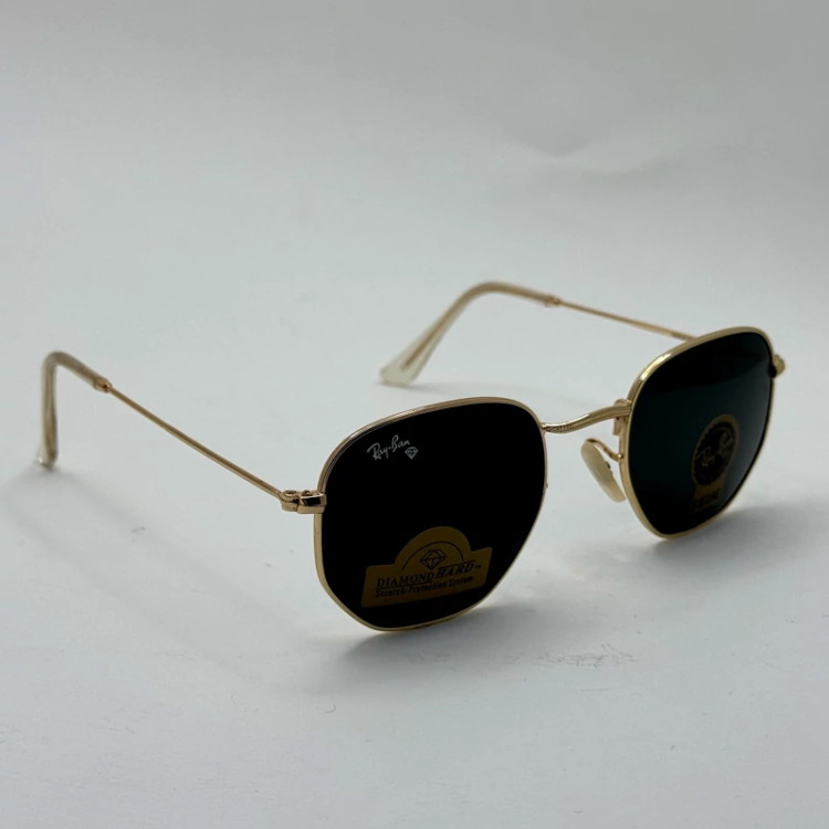 تصویر عینک ریبن هگزونال شیشه سنگ مشکی فریم طلایی به همراه پک کامل ریبن کد Rayban RB 3548