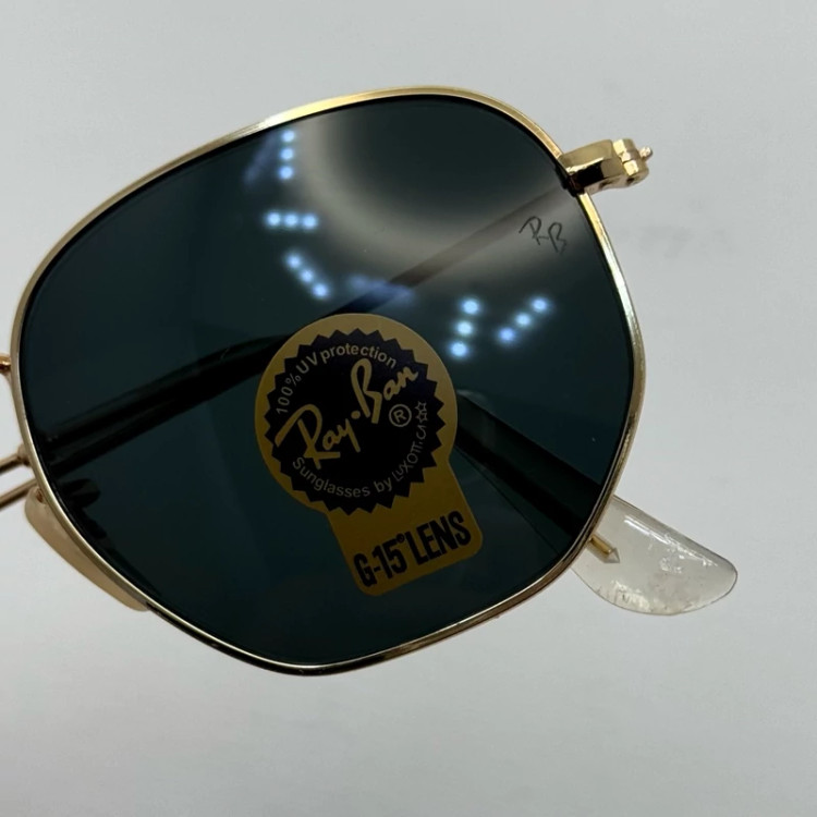 تصویر عینک ریبن هگزونال شیشه سنگ مشکی فریم طلایی به همراه پک کامل ریبن کد Rayban RB 3548