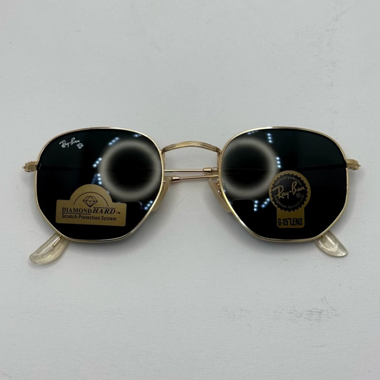 تصویر عینک ریبن هگزونال شیشه سنگ مشکی فریم طلایی به همراه پک کامل ریبن کد Rayban RB 3548