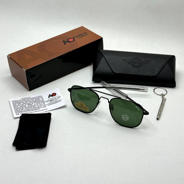 تصویر عینک آفتابی شیشه سنگ آمریکن اوپتیکال فریم مشکی عدسی سبز سایز 54 با پک کامل و آچار مخصوص عینک