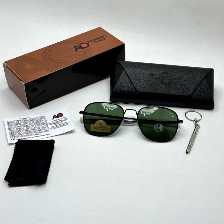 تصویر عینک آفتابی شیشه سنگ آمریکن اوپتیکال فریم مشکی عدسی سبز سایز 54 با پک کامل و آچار مخصوص عینک