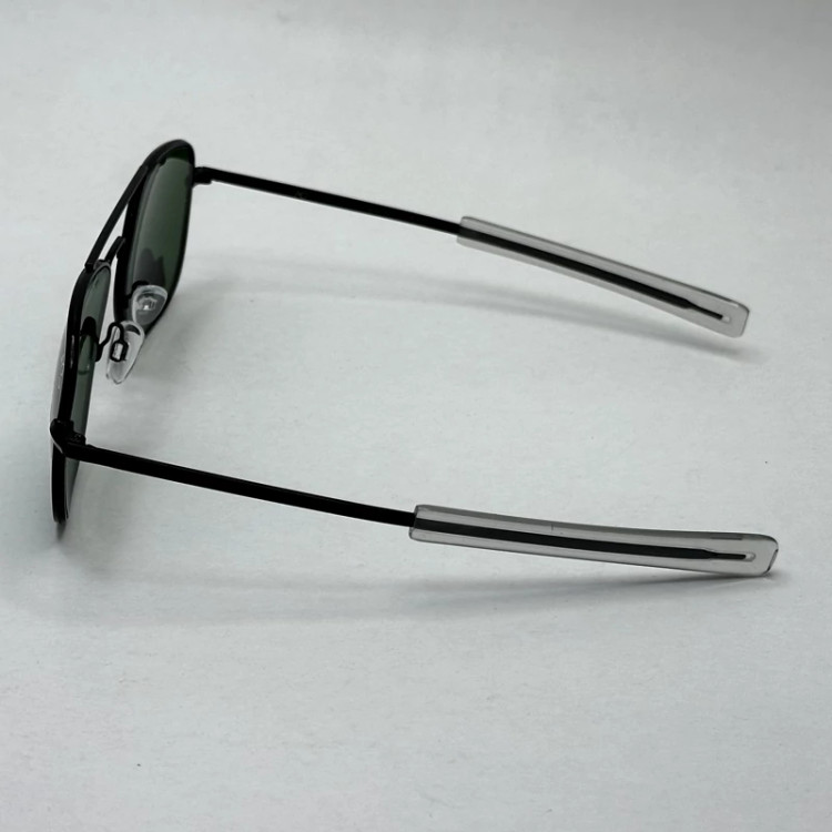 تصویر عینک آفتابی شیشه سنگ آمریکن اوپتیکال فریم مشکی عدسی سبز سایز 54 با پک کامل و آچار مخصوص عینک