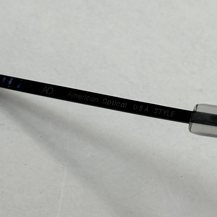 تصویر عینک آفتابی شیشه سنگ آمریکن اوپتیکال فریم مشکی عدسی سبز سایز 54 با پک کامل و آچار مخصوص عینک