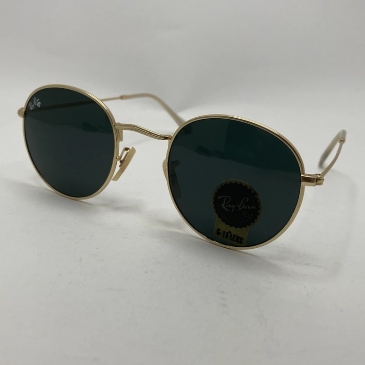 تصویر عینک آفتابی ریبن rayban گرد مشکی طلایی شیشه سنگ RB 3447
